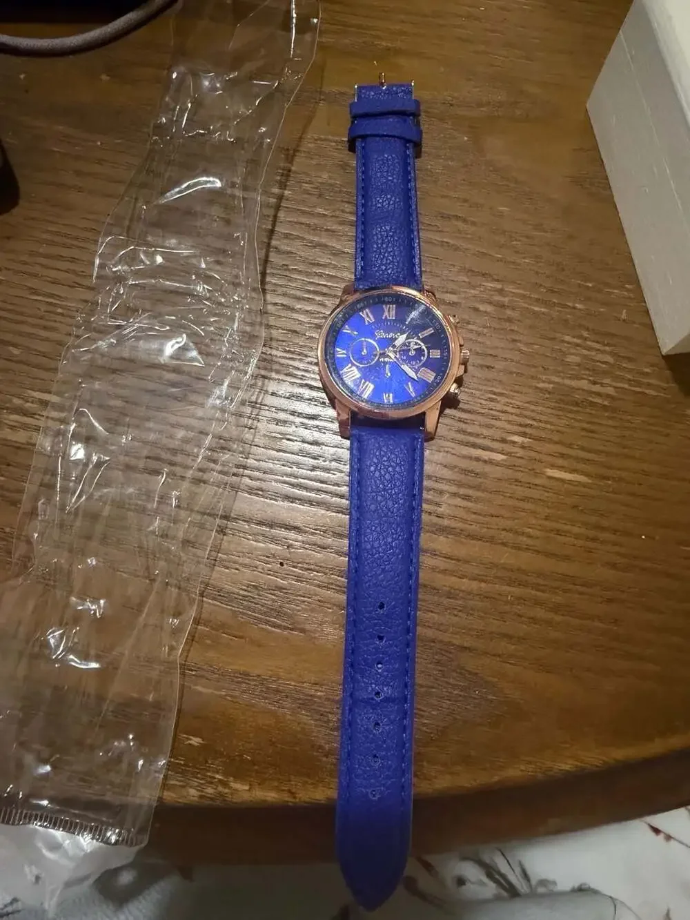 Geneva Roman Numeral Quartz Watch with Blue Leather Strap and Rose Gold Case